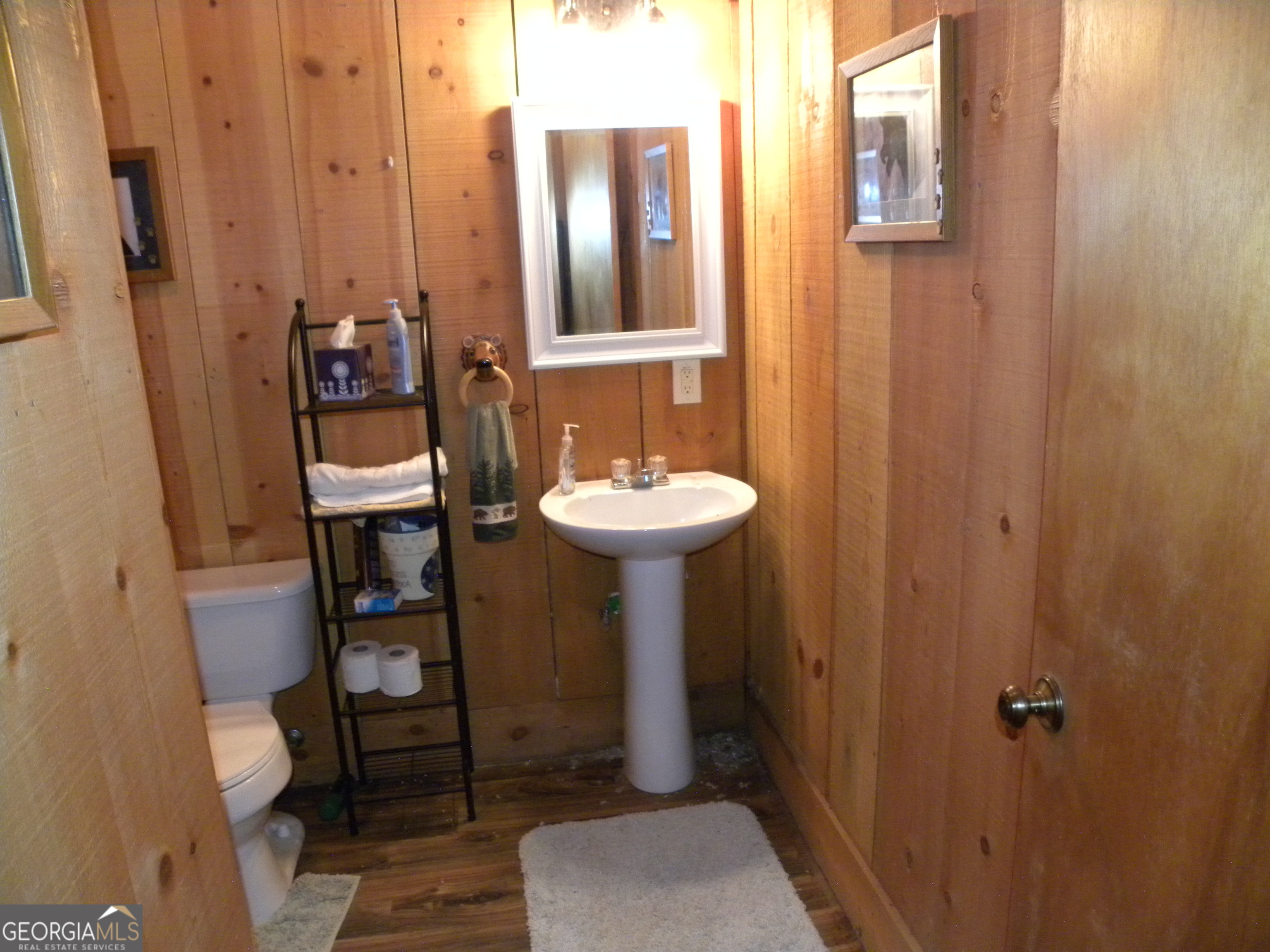 551 P Road Toccoa, GA 30577 - Photo 102 of 124 a bathroom with a sink and a mirror