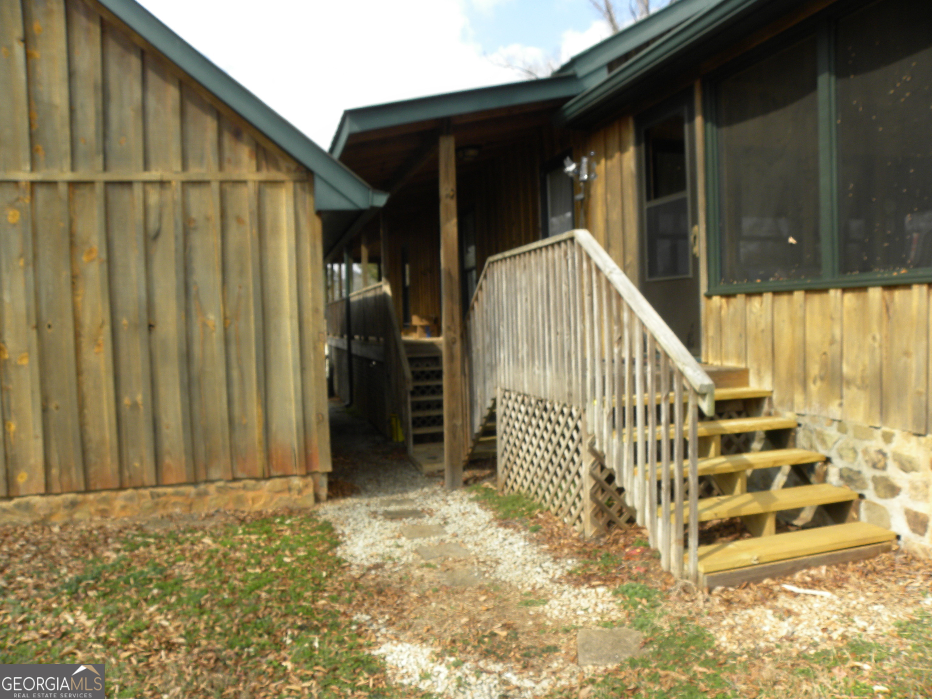551 P Road Toccoa, GA 30577 - Photo 107 of 124 Backside of garage with breezeway, entrance to house, and entrance to the screen porch