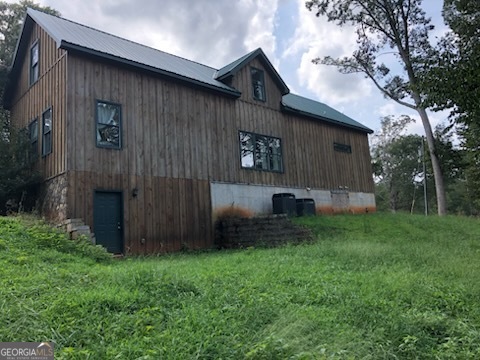551 P Road Toccoa, GA 30577 - Photo 122 of 124 a backyard of a house with lots of green space