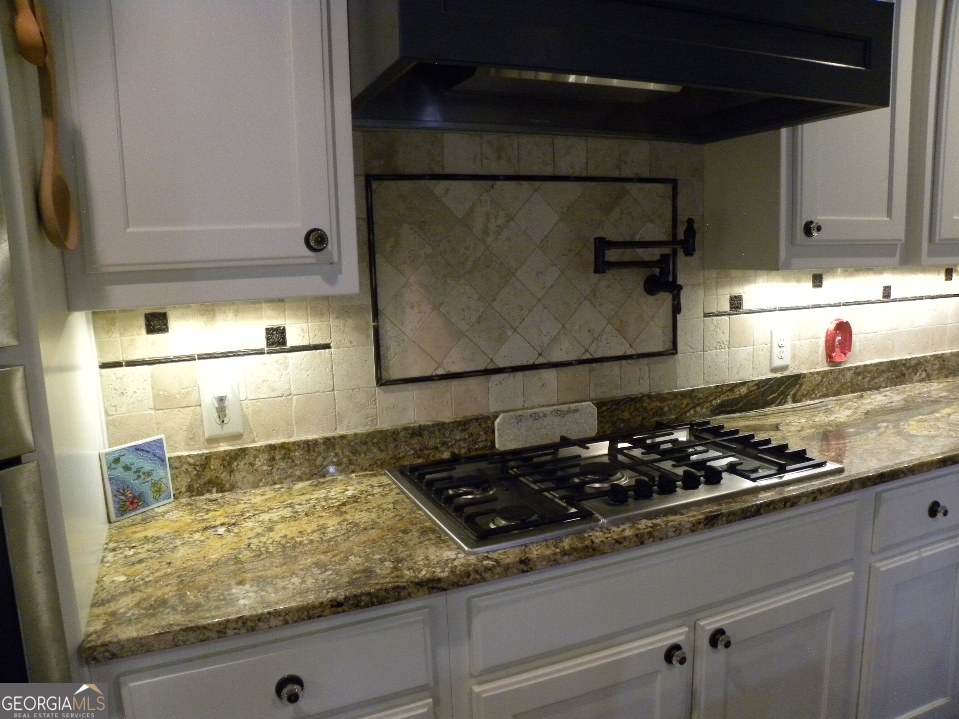 551 P Road Toccoa, GA 30577 - Photo 20 of 124 a kitchen with a stove and a refrigerator