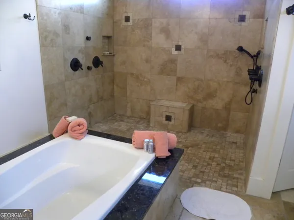 a view of outdoor space with green field and trees