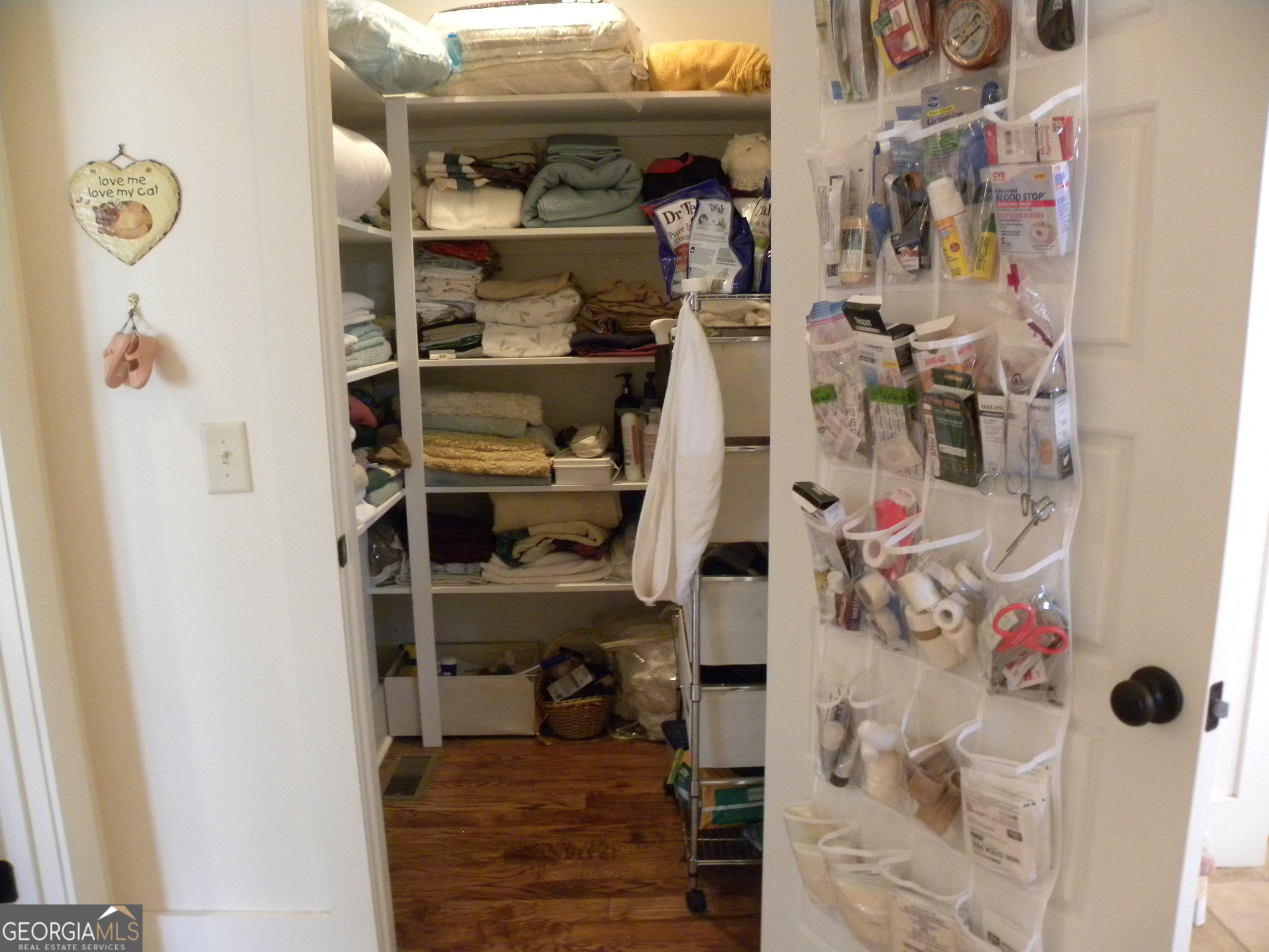 551 P Road Toccoa, GA 30577 - Photo 52 of 124 a view of walk in closet with clothes and shoes