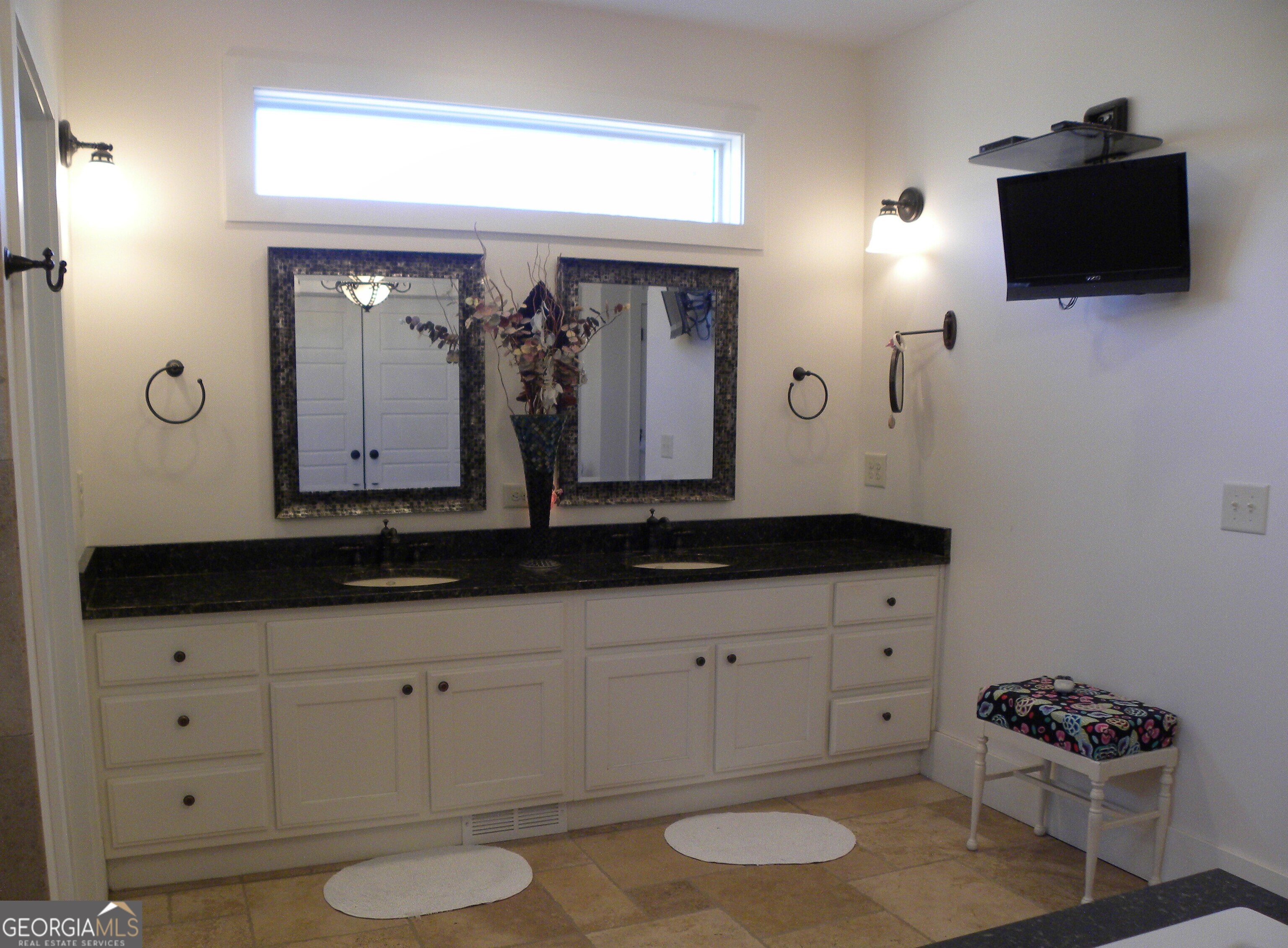 551 P Road Toccoa, GA 30577 - Photo 54 of 124 a bathroom with a sink a mirror and a toilet