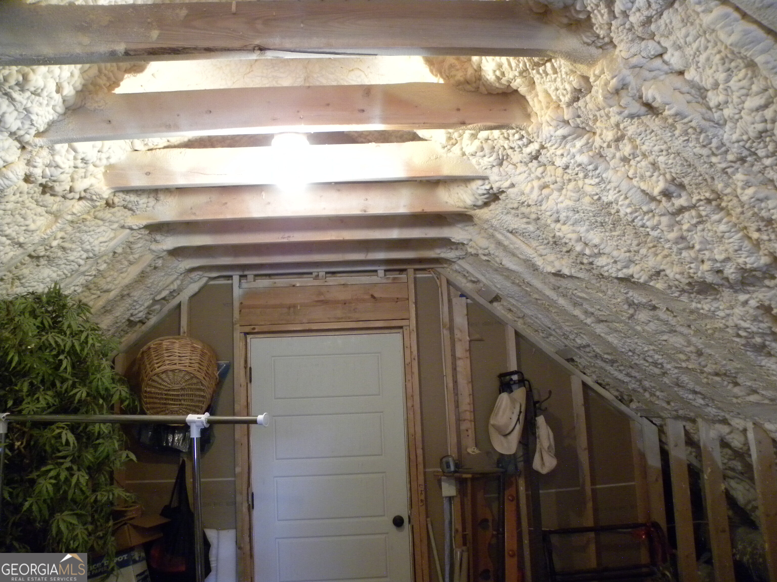 551 P Road Toccoa, GA 30577 - Photo 62 of 124 Unfinished attic space in loft with spray in foam for efficient insulation