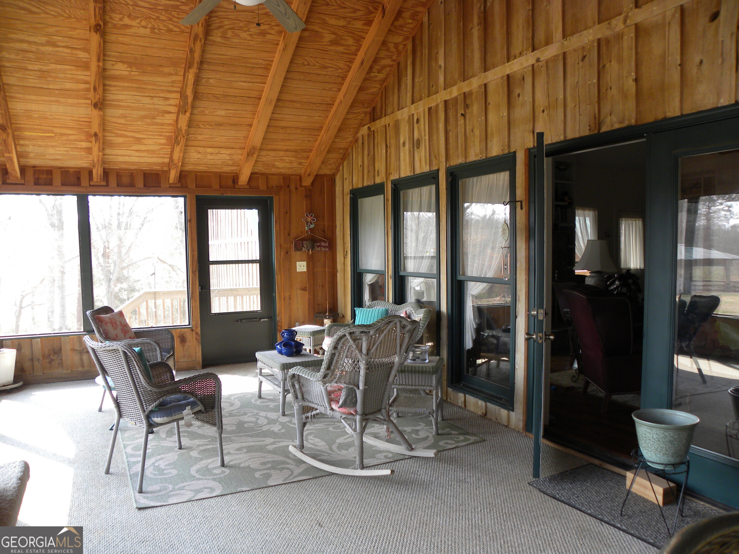551 P Road Toccoa, GA 30577 - Photo 68 of 124 a dining room with furniture and a floor to ceiling window