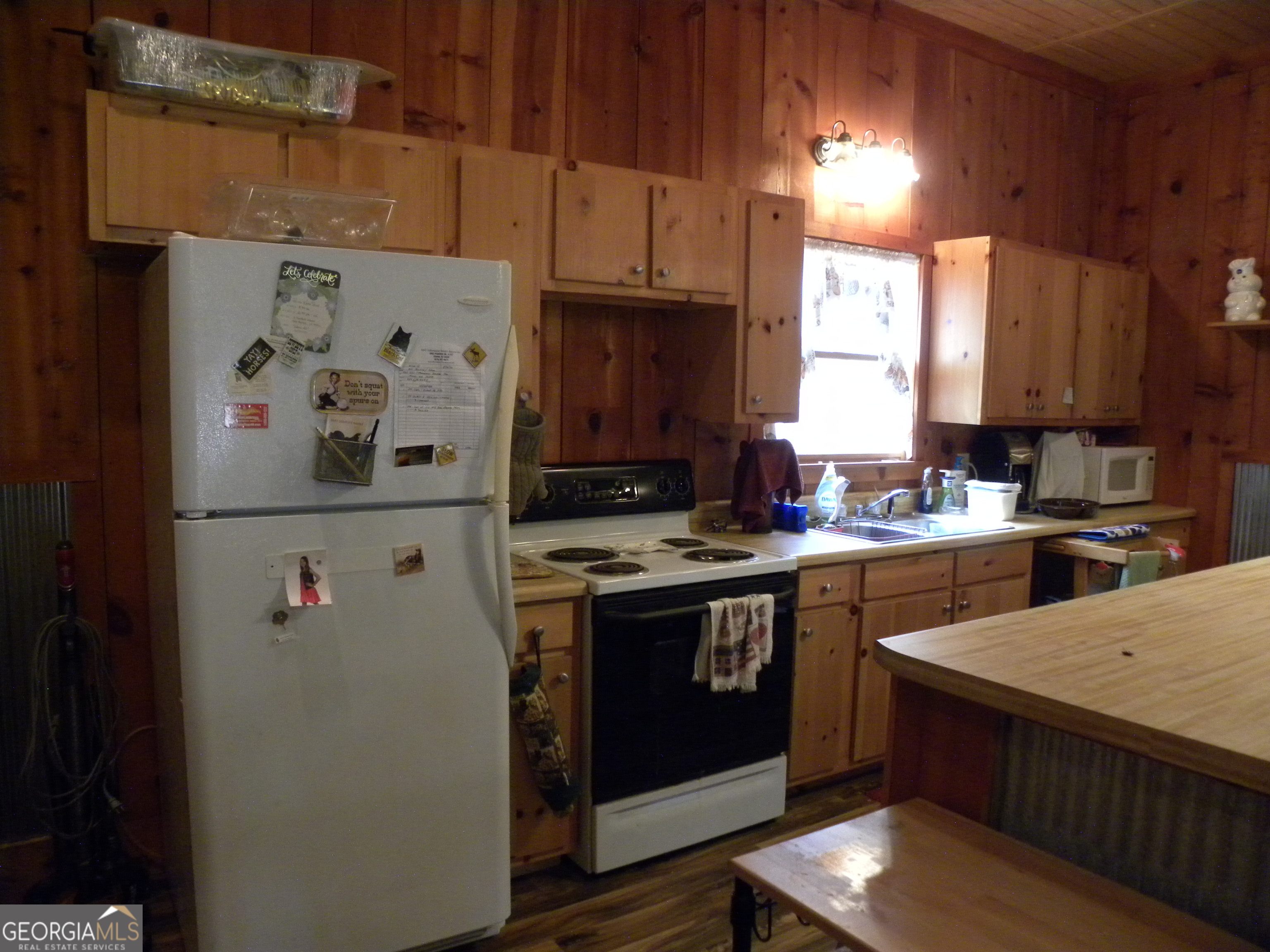 551 P Road Toccoa, GA 30577 - Photo 93 of 124 a kitchen with stainless steel appliances granite countertop a stove and a refrigerator