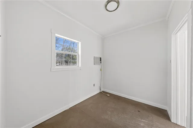 a view of a room that has a window in it