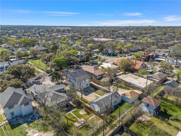 an aerial view of residential building with parking space