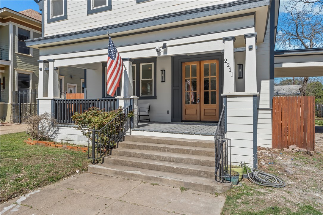 2211 Morrow Avenue Waco, TX 76707 - Photo 5 of 39 a view of a entrance door of the house with a fountain