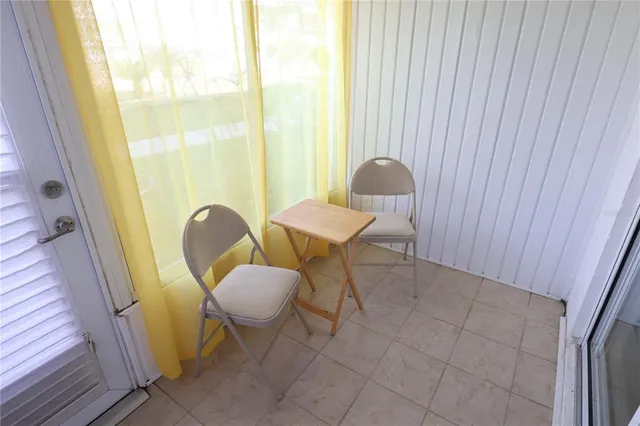 a view of a chair in a balcony