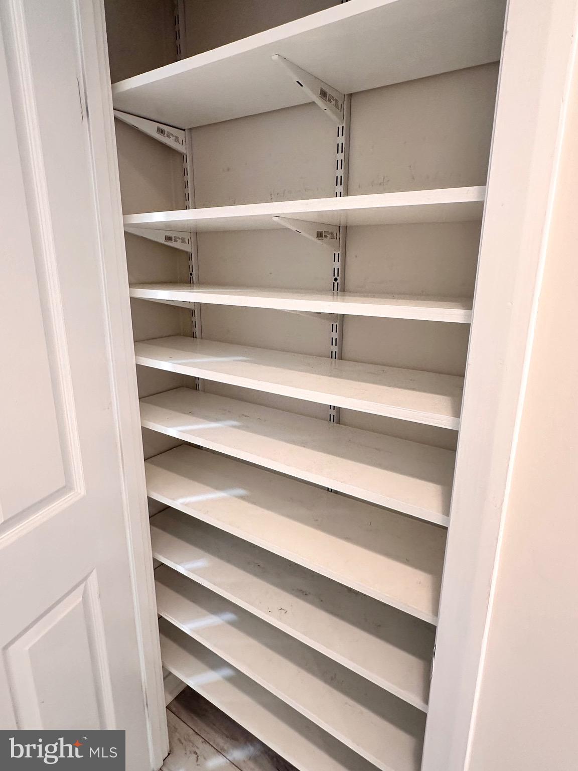 1201 North Garfield Street, Unit 408 Arlington, VA 22201 - Photo 16 of 26 a view of walk in closet with empty racks