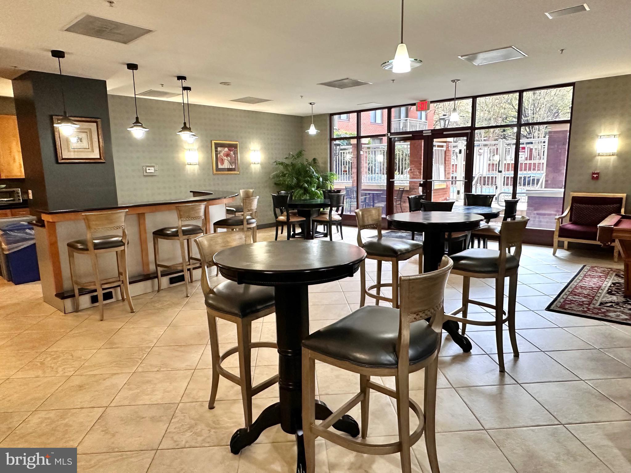 1201 North Garfield Street, Unit 408 Arlington, VA 22201 - Photo 20 of 26 a view of a dining room with furniture