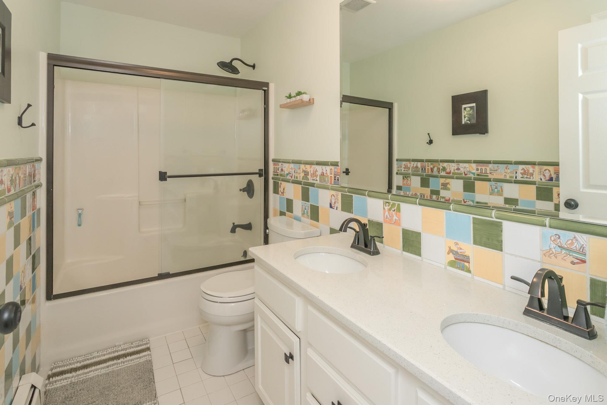 102 Beverly Road Chester, NY 10918 - Photo 37 of 49 a bathroom with a granite countertop sink toilet and shower