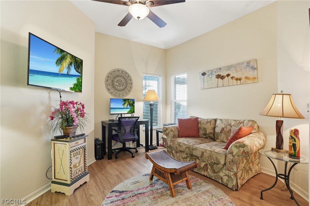 10730 Rio Mar Circle Estero, FL 33928 - Photo 7 of 47 a living room with furniture and a flat screen tv