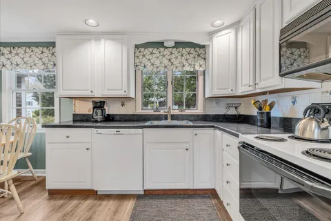 a view of a bathroom from the hallway
