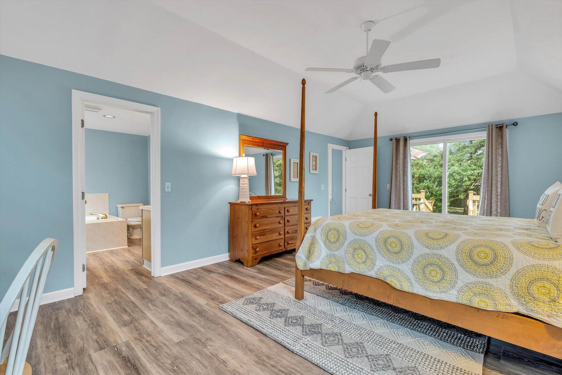 30 Cove Road Eastham, MA 02642 - Photo 43 of 72 a bedroom with a large bed and a dresser