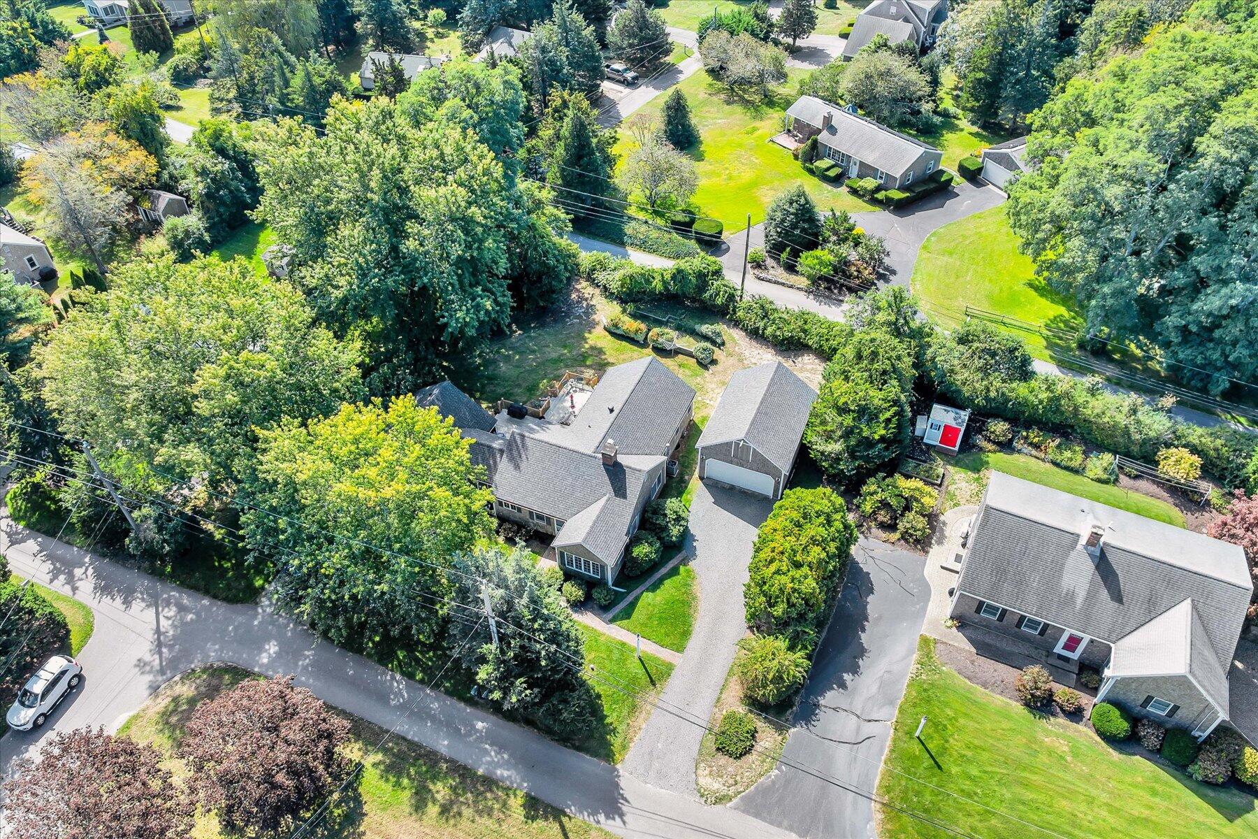 30 Cove Road Eastham, MA 02642 - Photo 7 of 72 an aerial view of residential house with outdoor space and swimming pool