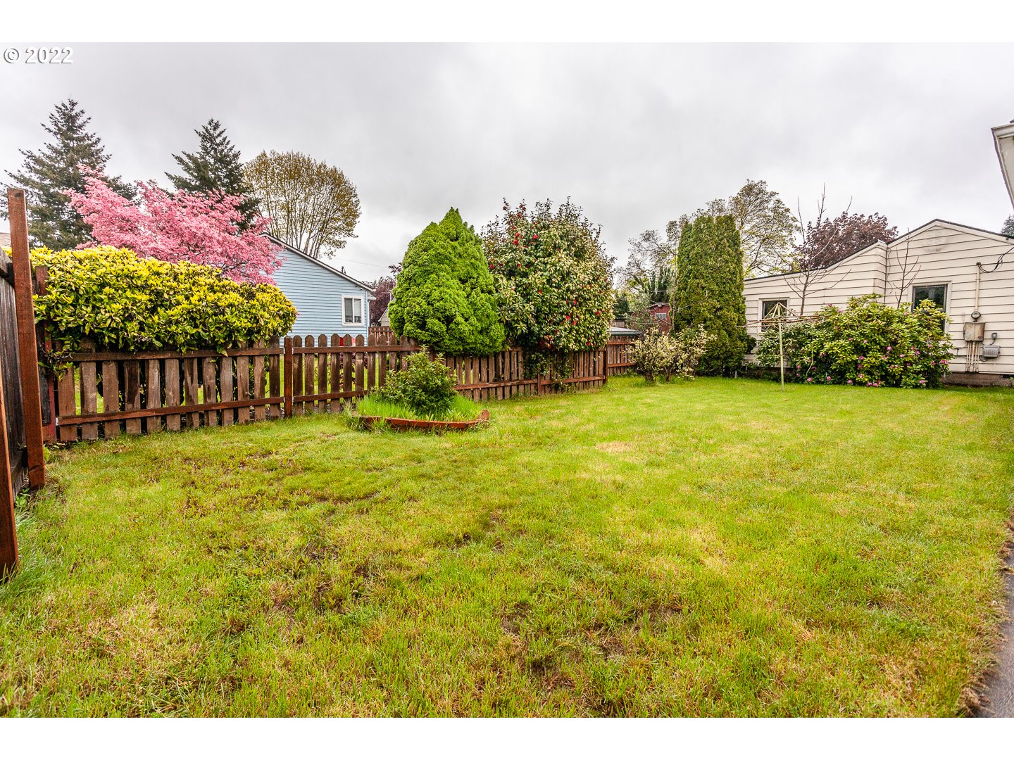3124 Southeast 64th Avenue Portland, OR 97206 - Photo 20 of 22 a view of a yard in front of a house