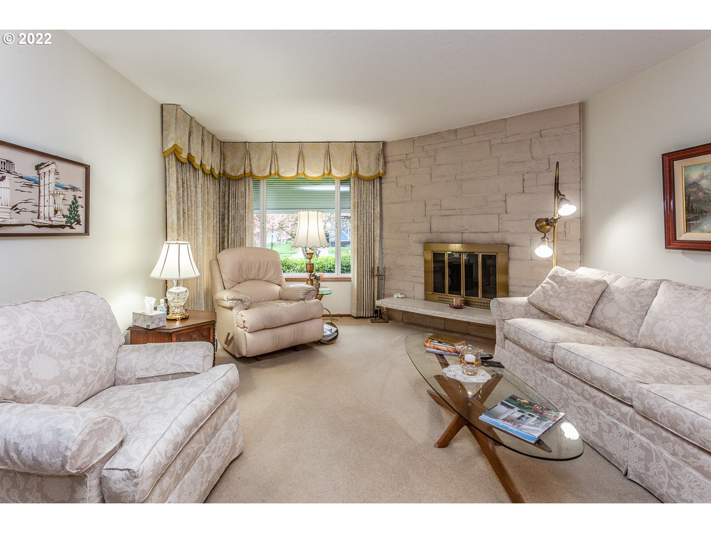 3124 Southeast 64th Avenue Portland, OR 97206 - Photo 3 of 22 a living room with furniture and a fireplace