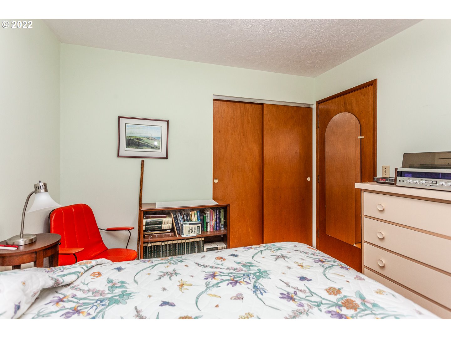 3124 Southeast 64th Avenue Portland, OR 97206 - Photo 10 of 22 a bedroom with a bed and a dresser