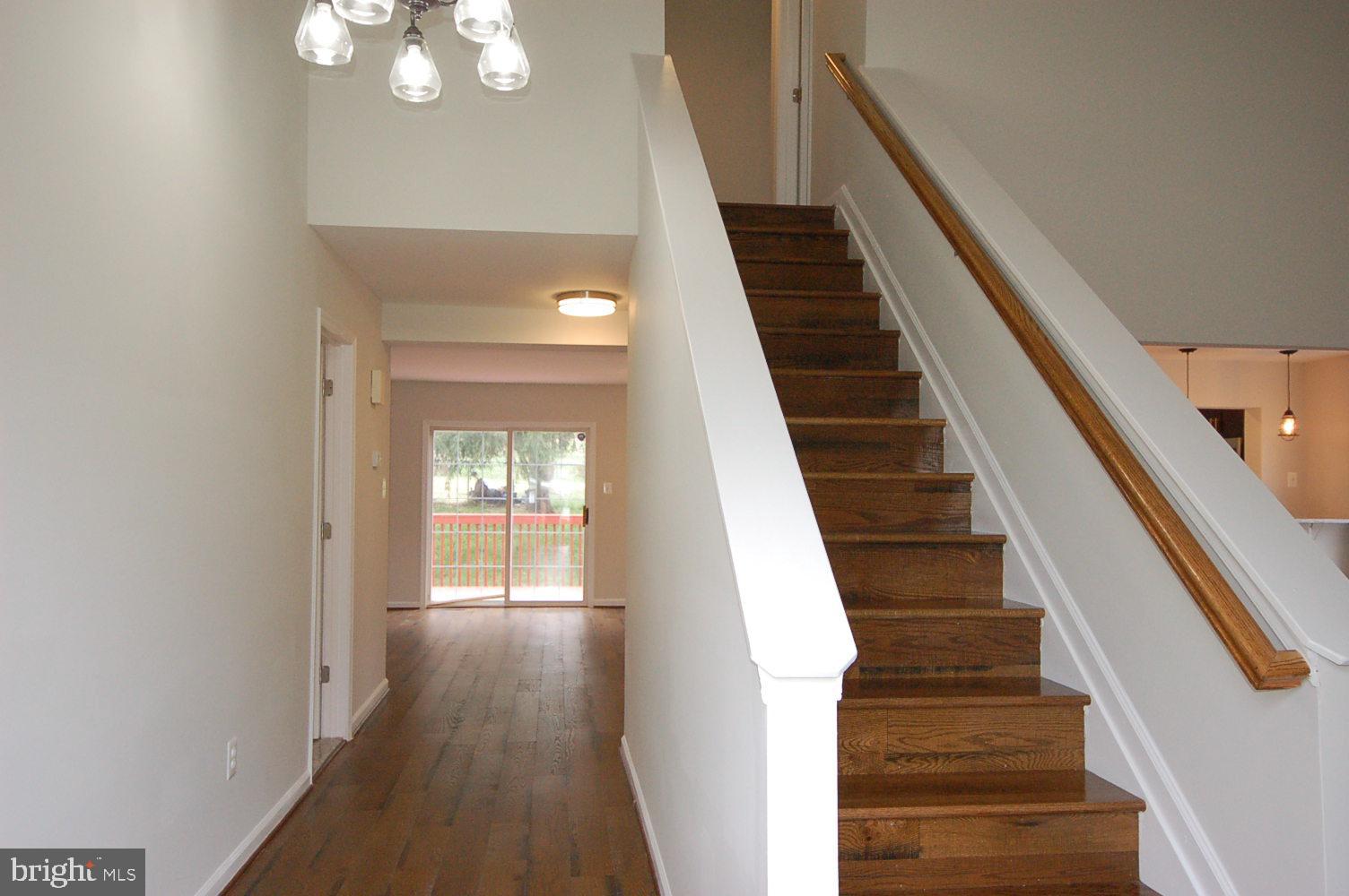 7409 Castlemoor Road Windsor Mill, MD 21244 - Photo 22 of 59 Hardwood stairs
