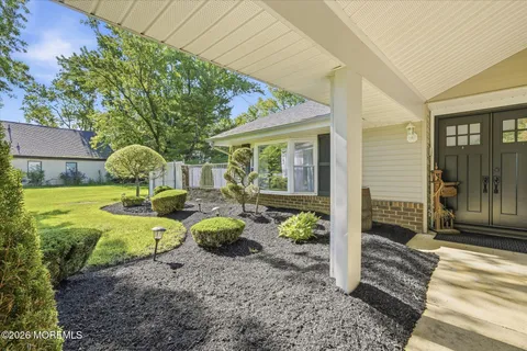 a house view with a seating space and garden view