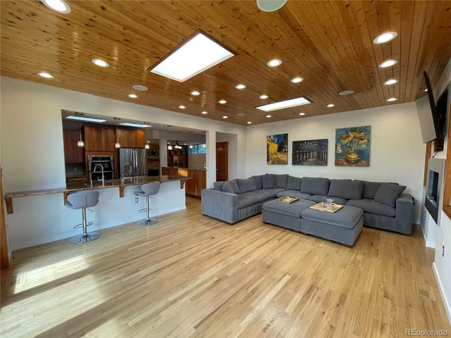 a view of an empty room with a fireplace