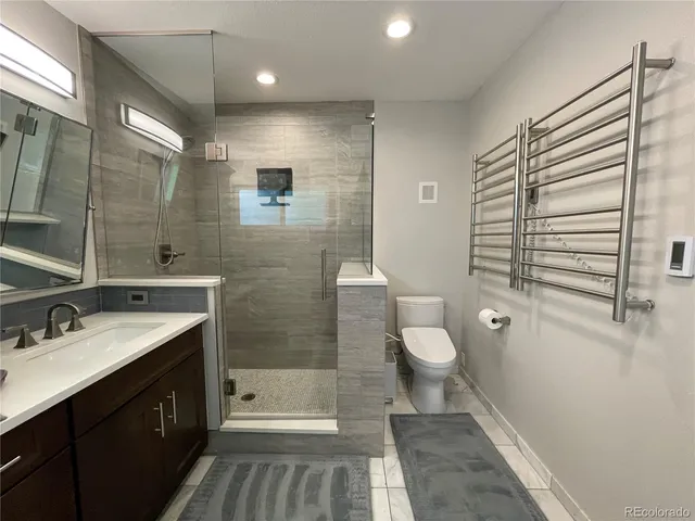 a bed room with a bed and a lamp