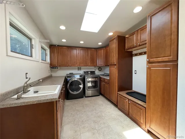 a view of living room with furniture and a flat screen tv