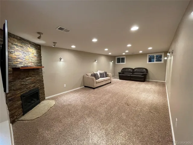 a living room with furniture and a couch
