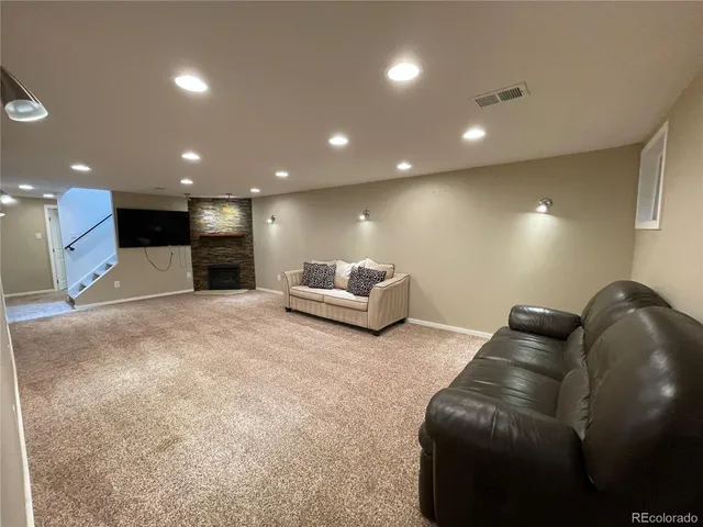 a living room with furniture and a couch