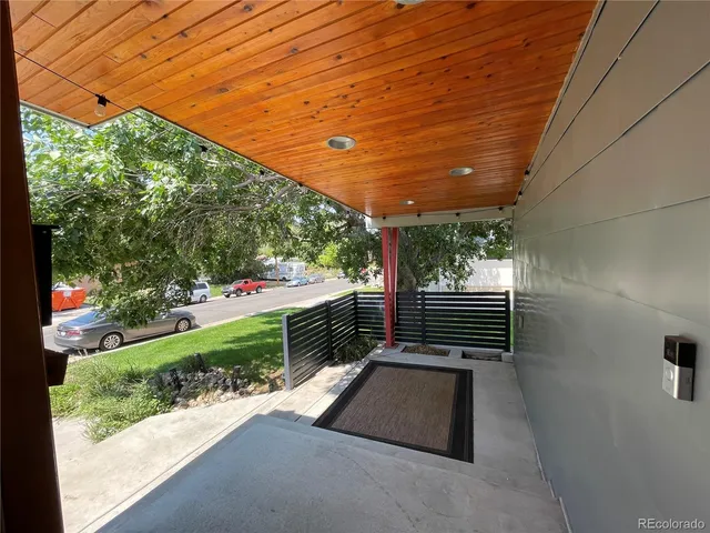 a view of a backyard of the house
