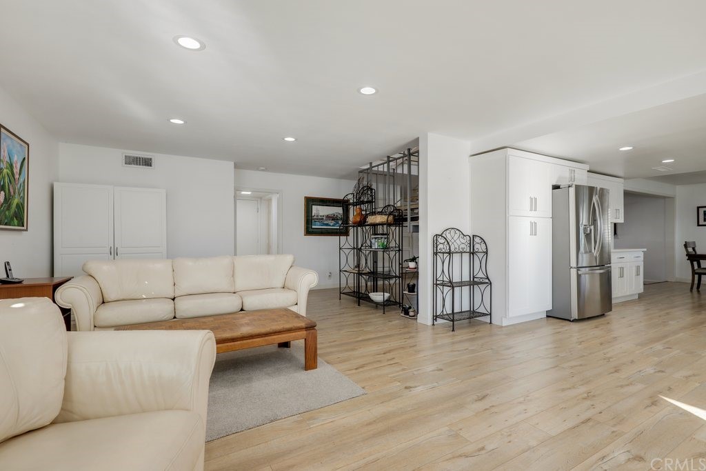 13772 Ridgecrest Circle Tustin, CA 92780 - Photo 21 of 69 a living room with furniture and a wooden floor