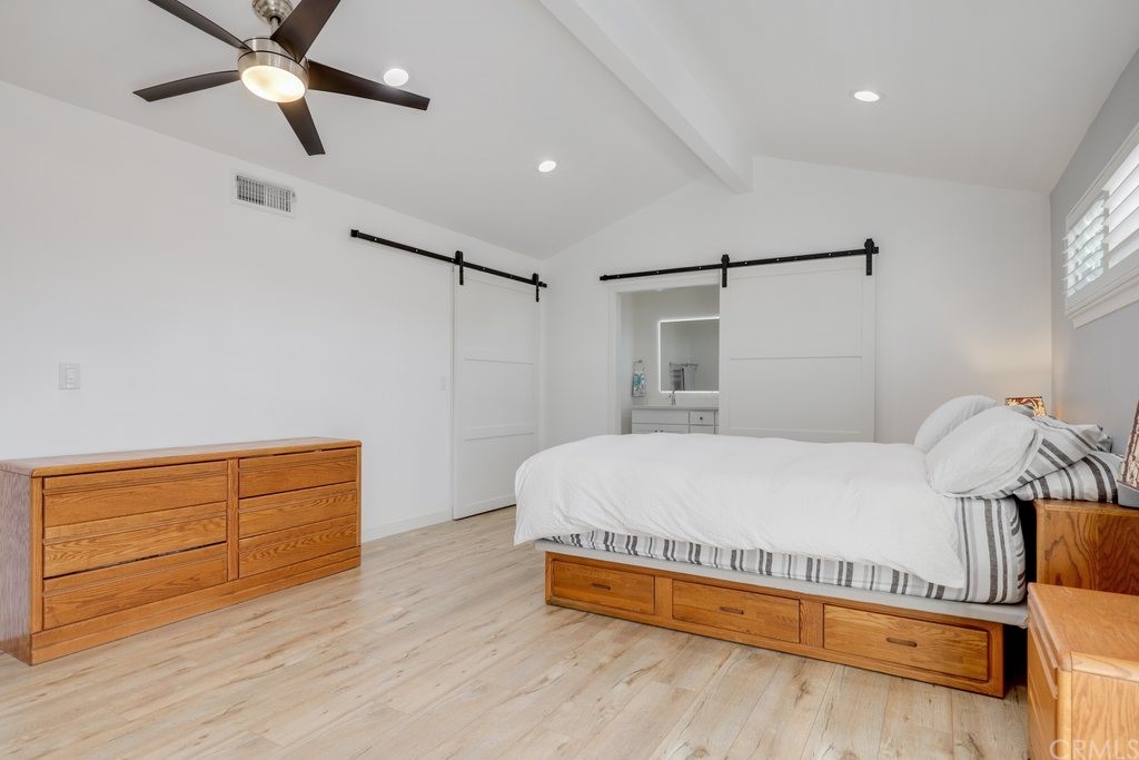 13772 Ridgecrest Circle Tustin, CA 92780 - Photo 28 of 69 a bedroom with a bed and a dresser