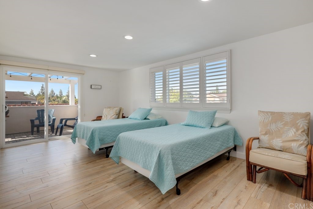 13772 Ridgecrest Circle Tustin, CA 92780 - Photo 38 of 69 a bedroom with two beds and a large window