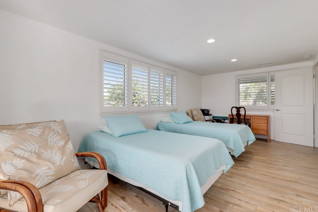 13772 Ridgecrest Circle Tustin, CA 92780 - Photo 39 of 69 a bedroom with two beds and a window