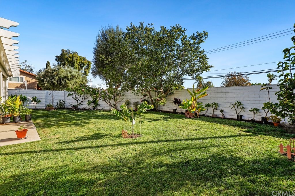 13772 Ridgecrest Circle Tustin, CA 92780 - Photo 48 of 69 a backyard of a house with lots of green space