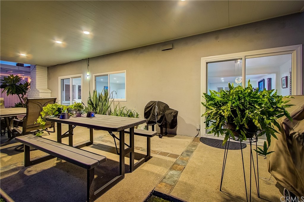 13772 Ridgecrest Circle Tustin, CA 92780 - Photo 60 of 69 a view of a livingroom with furniture and a potted plant