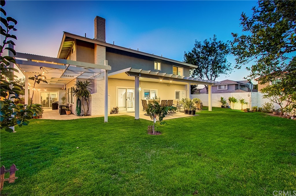 13772 Ridgecrest Circle Tustin, CA 92780 - Photo 64 of 69 a front view of a house with a yard
