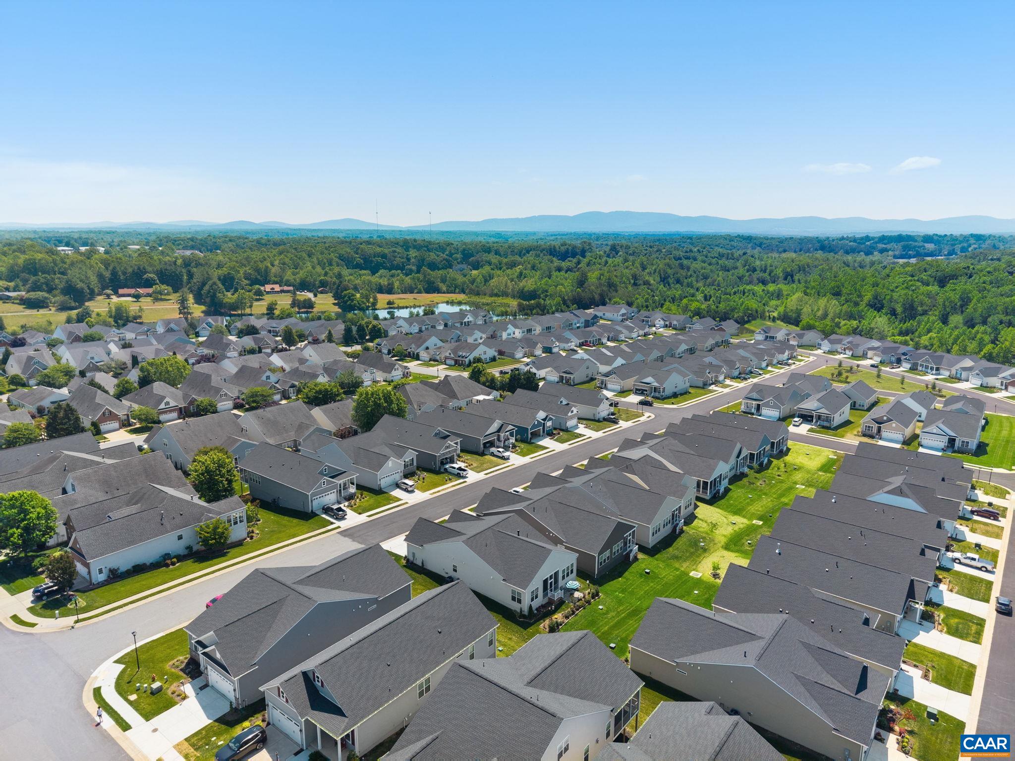 124 Stodghill Drive Ruckersville, VA 22968 - Photo 46 of 58 an aerial view of a city with lots of residential buildings