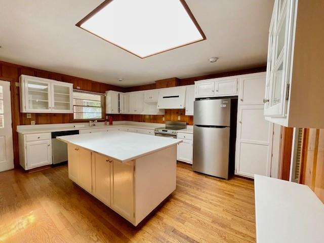 2396 Lavista Road Northeast Atlanta, GA 30329 - Photo 6 of 28 a kitchen with stainless steel appliances granite countertop a refrigerator a stove a sink and a refrigerator