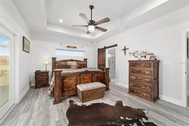 a view of swimming pool with seating area and furniture