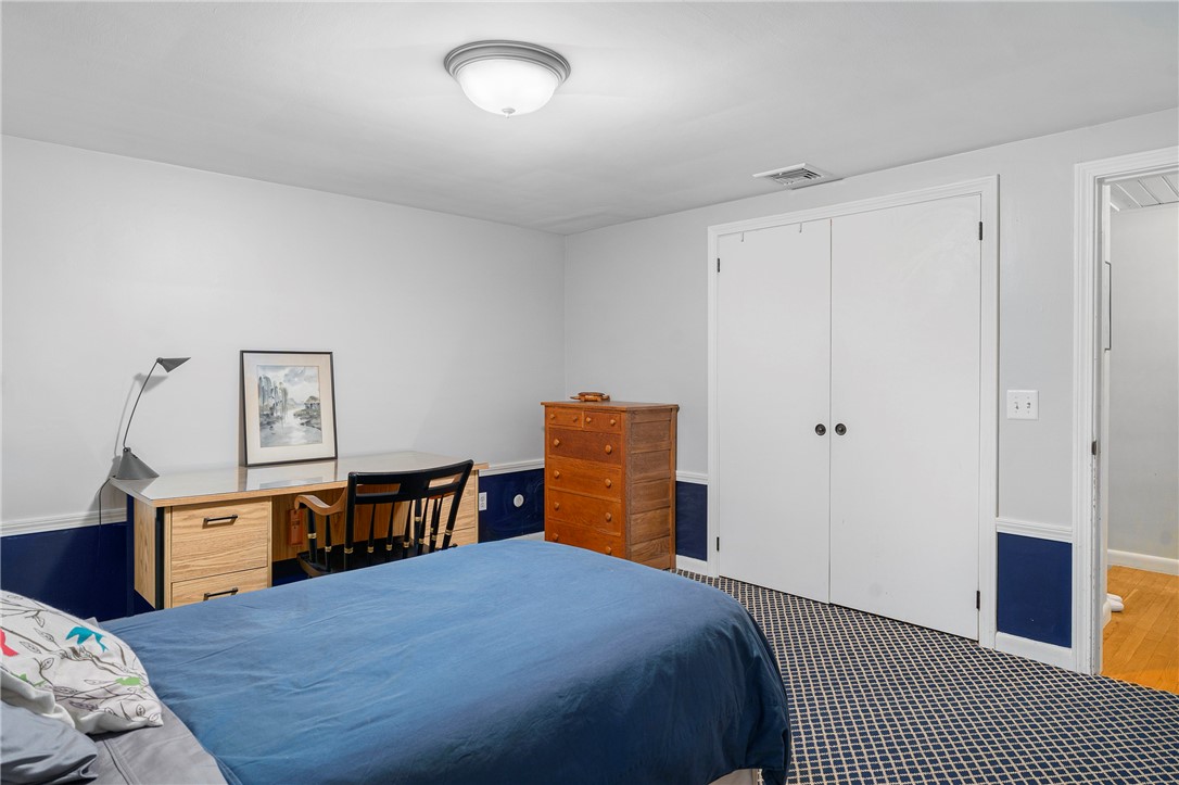 99 Larch Road East Greenwich, RI 02818 - Photo 23 of 38 2nd view of 2nd bedroom, another closet to the left of the bed, come to a showing to see it in person!