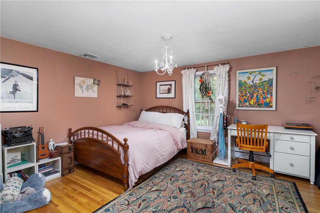 99 Larch Road East Greenwich, RI 02818 - Photo 24 of 38 Bedroom #3, double closet and ample space for anyone to feel relaxed and be able to enjoy their own space