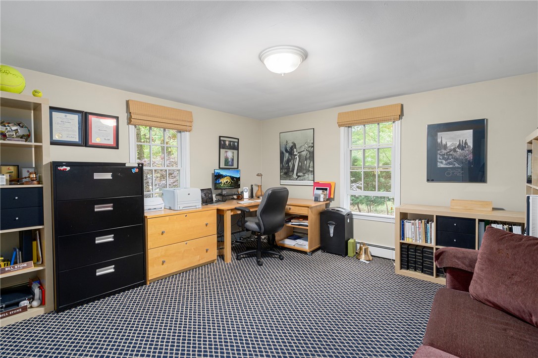 99 Larch Road East Greenwich, RI 02818 - Photo 25 of 38 Bedroom #4. Current homeowners used this spacious room for an office. Tons of light to make any work day a breeze.