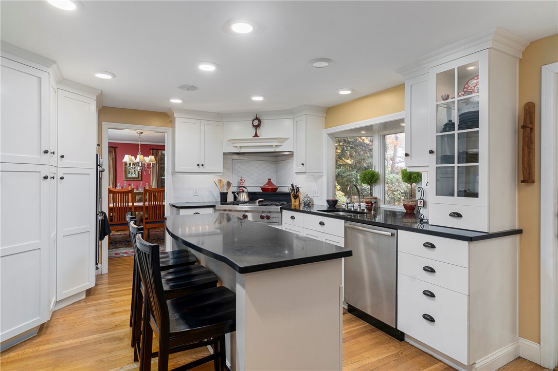 99 Larch Road East Greenwich, RI 02818 - Photo 10 of 38 A bright kitchen with appliances that would make the any chef smile. Wolf range, Fisher and Paykel double wall oven.Bosch dishwasher, LG french door refrigerator. Absolutely perfect!