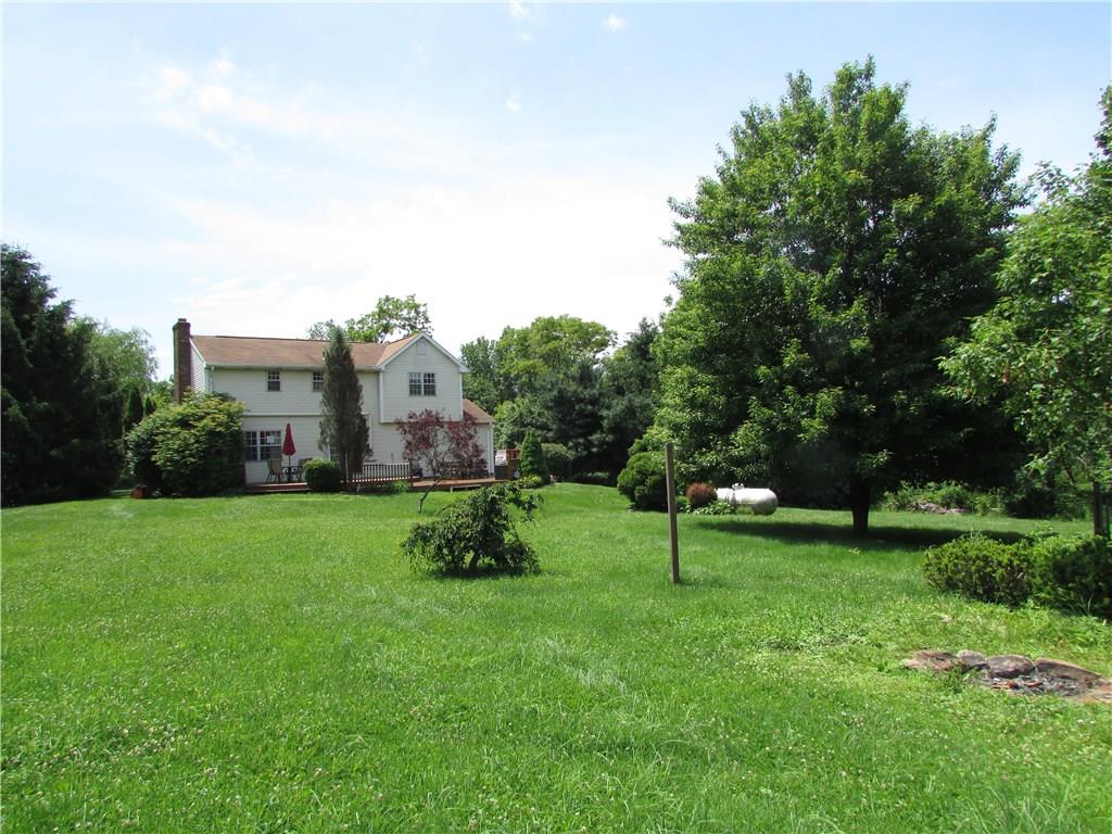 307 County Line Road Burgettstown, PA 15021 - Photo 3 of 24 Rear of home.2 tier deck with sunsetter awning.Level yard.