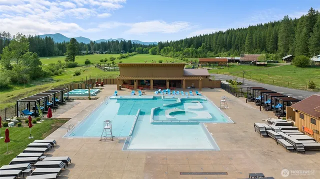 a view of a yard with an outdoor seating