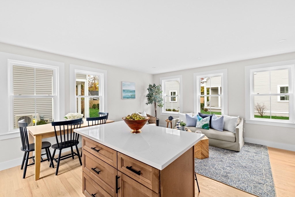 19 Ford Place, Unit 3 Scituate, MA 02066 - Photo 11 of 41 a living room with furniture and a large window