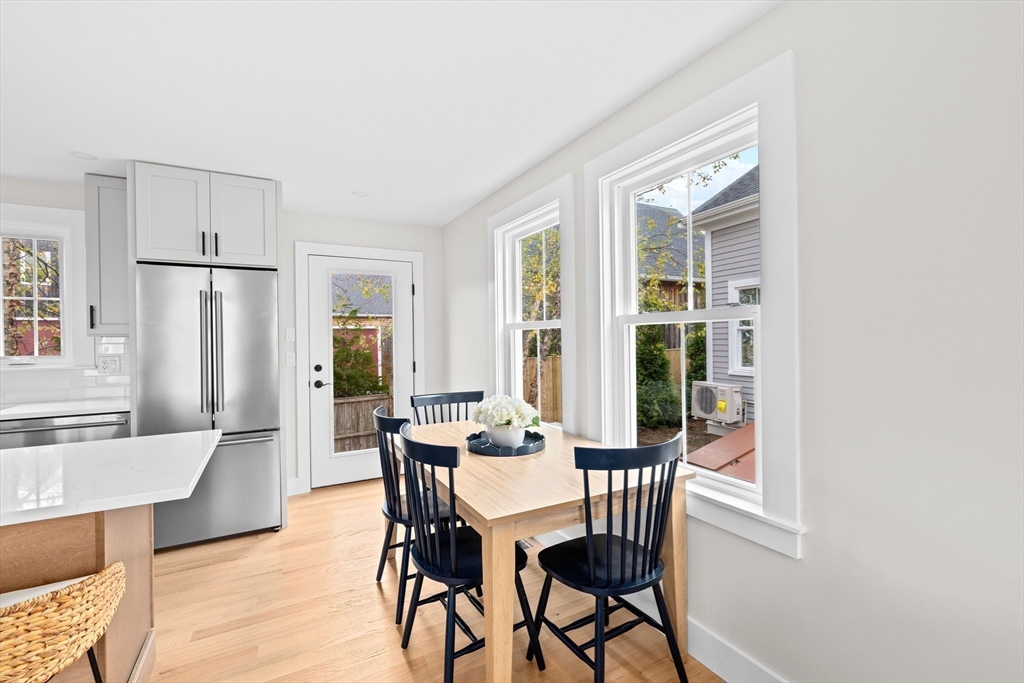 19 Ford Place, Unit 3 Scituate, MA 02066 - Photo 13 of 41 a view of a dining room with furniture and wooden floor